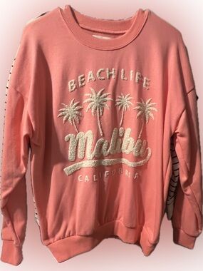 No Boundaries Coral Crewneck with Textured White Palm Graphic oversized